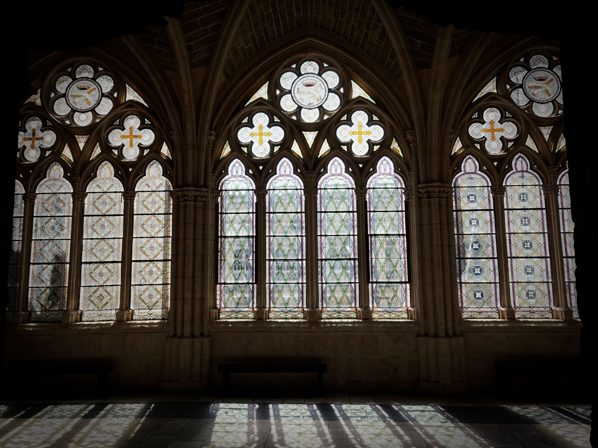 Glass windows with arches and columns of the Burgos Cathedral, in Spain